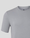 Close up of a light gray men's core crest tee showing the blue chest crest near the neckline