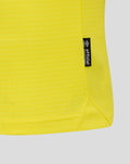 Close up of the yellow Rangers goalkeeper shirt hem with a black official licensed product tag along the side seam