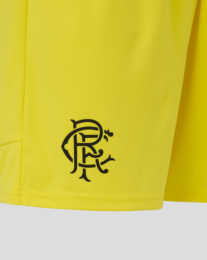 Close up of the yellow goalkeeper shorts showing team crest and Umbro branding