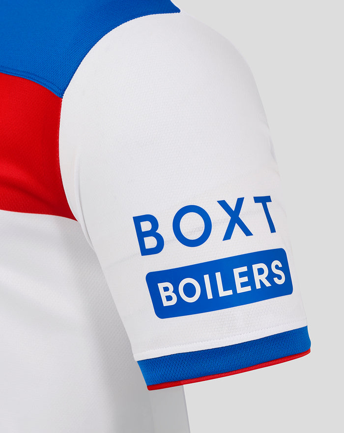 Sleeve close up of white Rangers away shirt with BOX BOILERS logo and blue red cuff trim