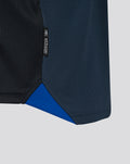 Close up of Rangers FC Pro Third shirt showing textured fabric and a dark blue panel with a small hem label