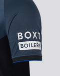 Close-up of navy sleeve with white sponsor patch reading BOX1 BOILERS