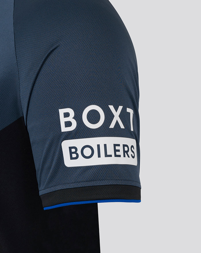 Close-up of navy sleeve with white sponsor patch reading BOX1 BOILERS