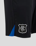 Close-up of the shorts showing a white Rangers crest on the left leg and a blue side panel on black fabric
