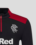Close-up of men's black coaches training quarter zip top with red shoulder panel and white crest on chest.
