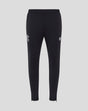 Front view of black training knit pants with white crest logos on each thigh.