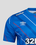 Blue home matchday jersey with bold diagonal stripes, Umbro logo and 32Red sponsor.