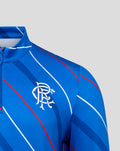 Close-up of blue Rangers jersey shoulder showing club crest and Umbro logo.