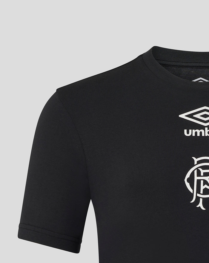 Close up of black Junior 25/26 presentation logo T-shirt showing white Umbro diamond and club crest on the chest.