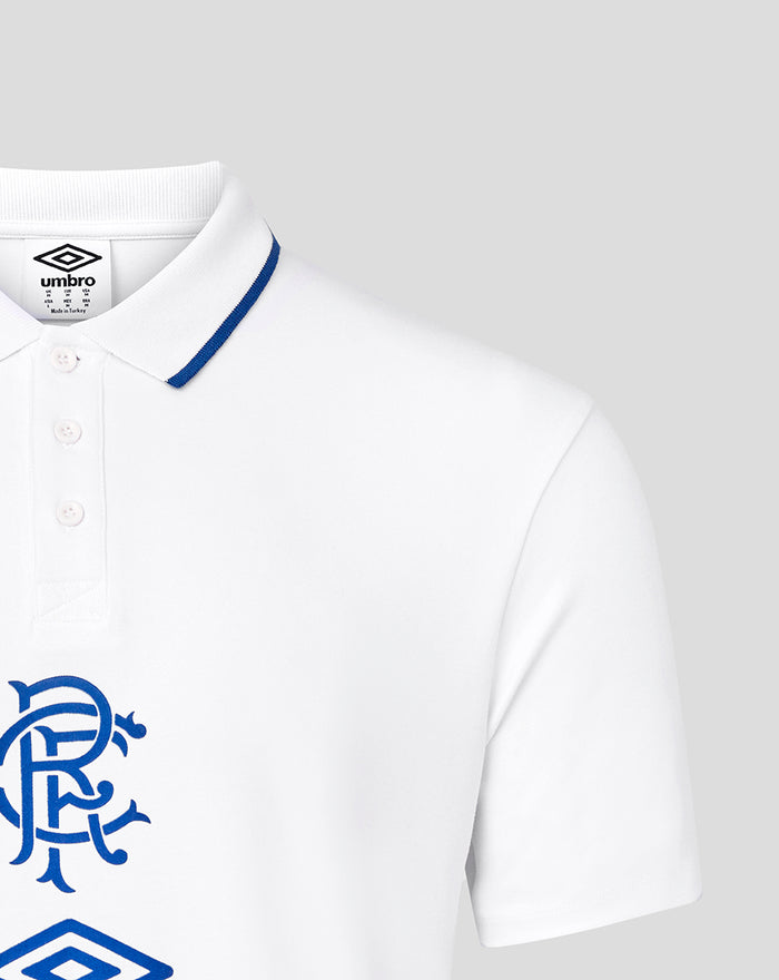 White travel short sleeve polo with blue collar trim and partial blue chest emblem