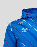 Shoulder close up highlighting the 32Red sponsor text and Umbro logo on the blue striped jacket