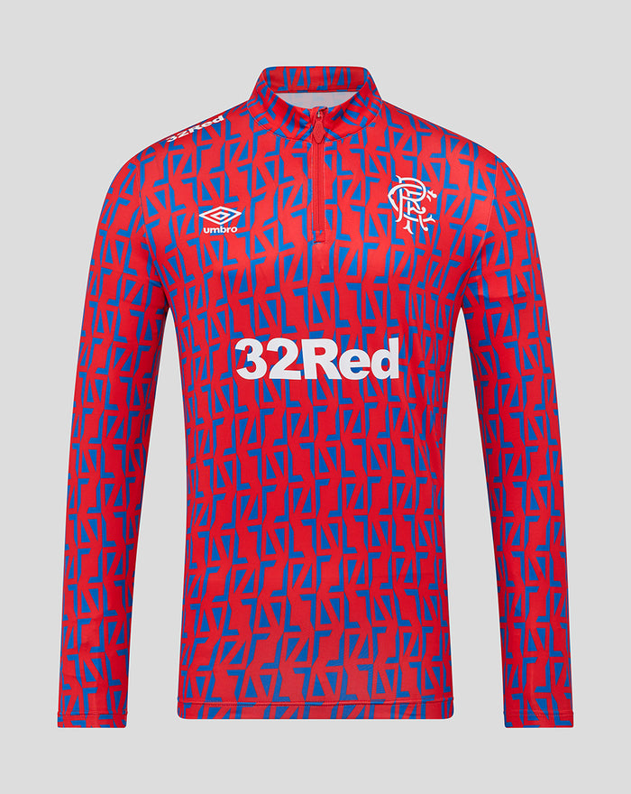 Front view of a red and blue geometric patterned unisex matchday quarter zip jersey with 32Red sponsor