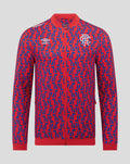 Unisex red and blue away matchday jacket with geometric print and club crest on the chest