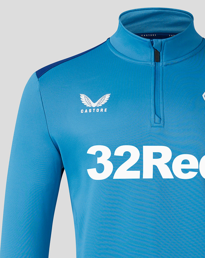 Blue training fleece with large 32Red print on chest, left chest club crest and right chest Castore logo