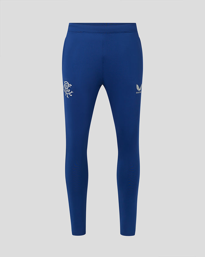 Front view of blue Rangers 23/24 matchday training pants with club crest on the thigh and Castore branding