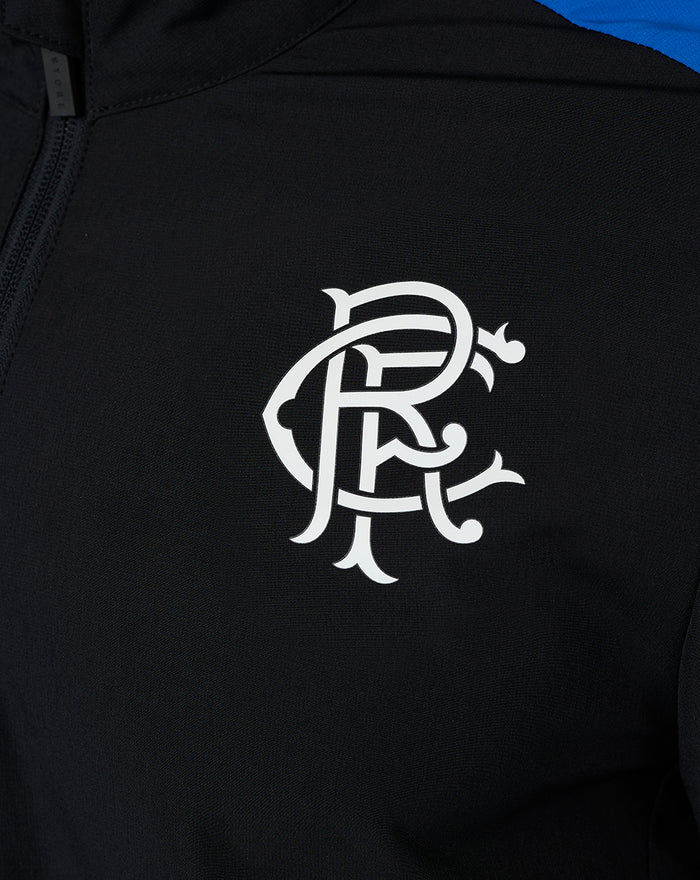 Close-up of black jacket chest showing a large white Rangers crest on the fabric