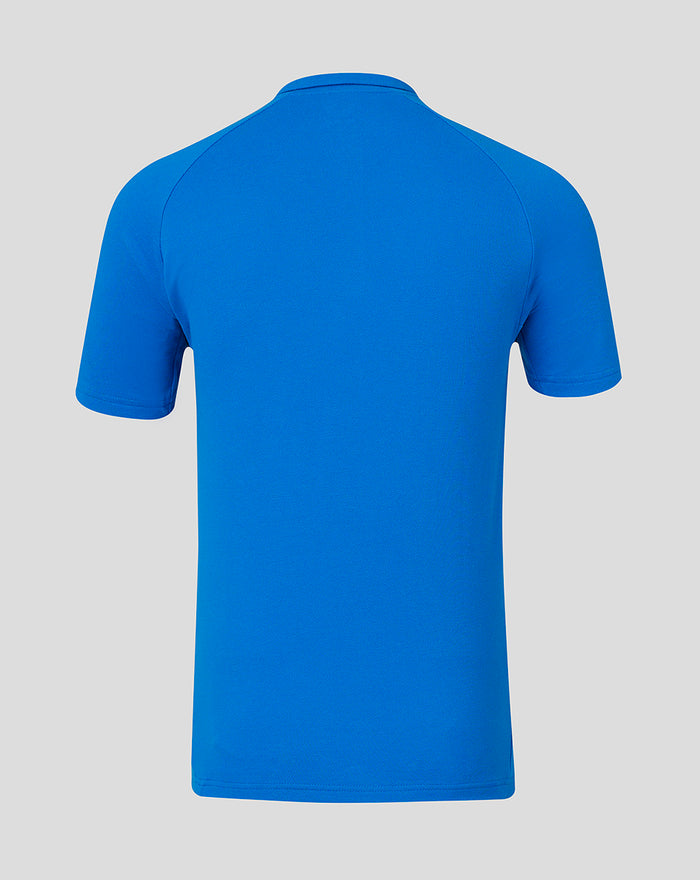 Back view of blue Rangers polo shirt with clean silhouette, raglan sleeves and split hem