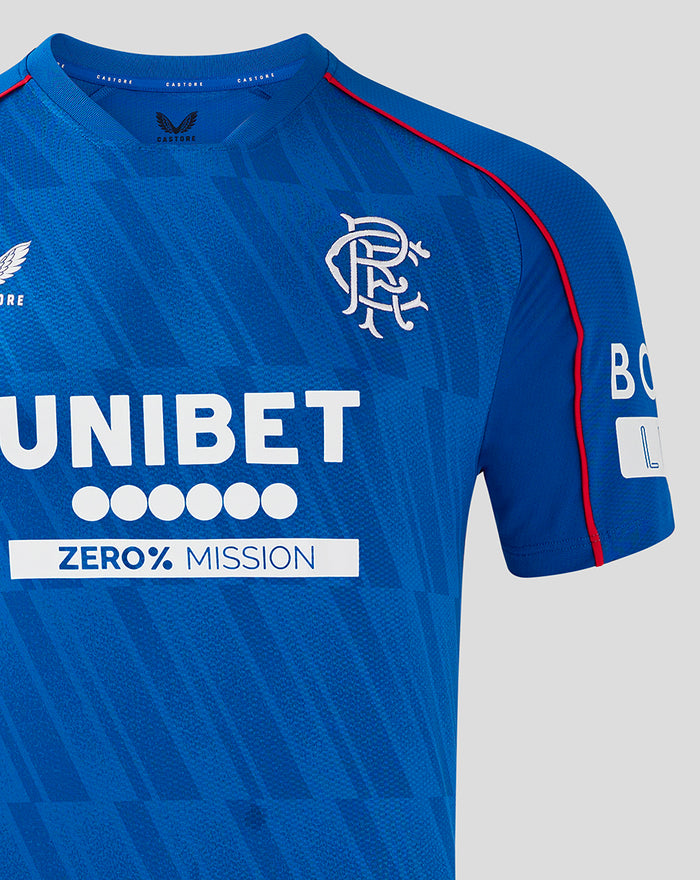 Close up of a man in a blue Rangers jersey featuring the UNIBET sponsor and crest