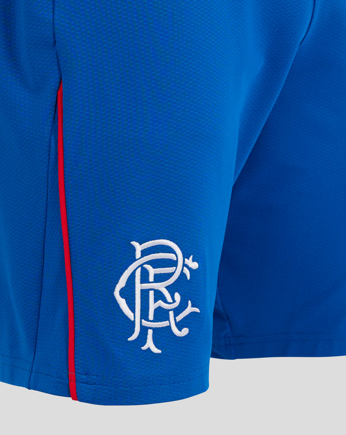 Close up of blue women's Pro Home Alternate Short fabric with red piping and white embroidery.