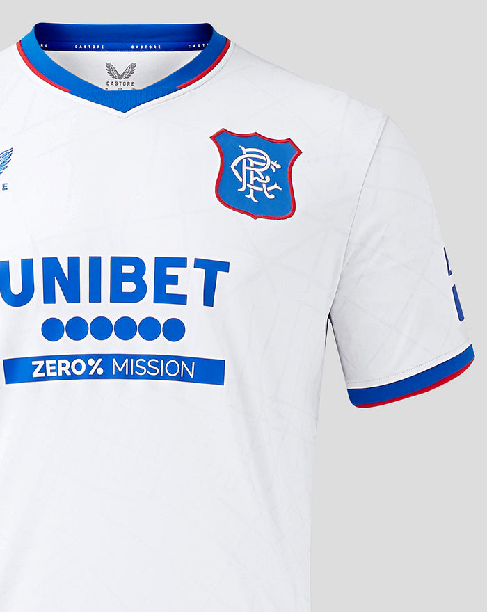 Close-up of white Rangers away shirt showing crest on left chest and UNIBET sponsor across the front with zero percent mission graphic.
