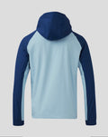 Back view showing navy hood and color-blocked shoulders on light blue Rangers training jacket