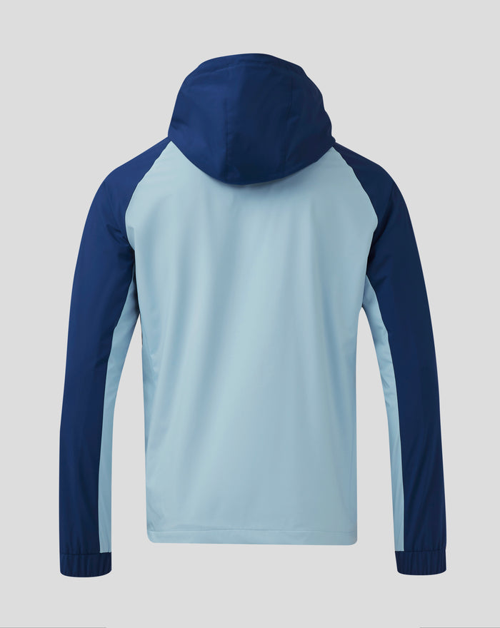 Back view showing navy hood and color-blocked shoulders on light blue Rangers training jacket