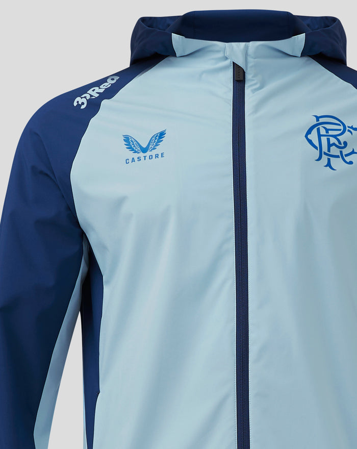 Front view of light blue Rangers training jacket with navy sleeves and chest logos