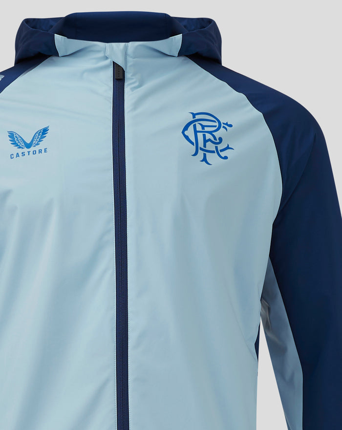 Close-up of Rangers training rain jacket showing light blue torso navy sleeves and front zip.