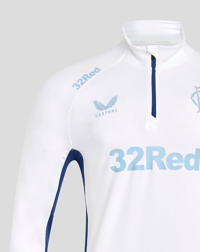 Close-up of the white top showing a navy zip, light blue 32Red lettering and Castore logo on the chest.