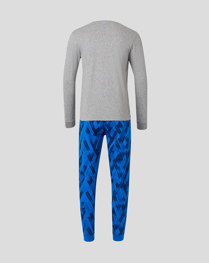 Back view of grey long sleeve pajama top with bright blue patterned pajama pants.