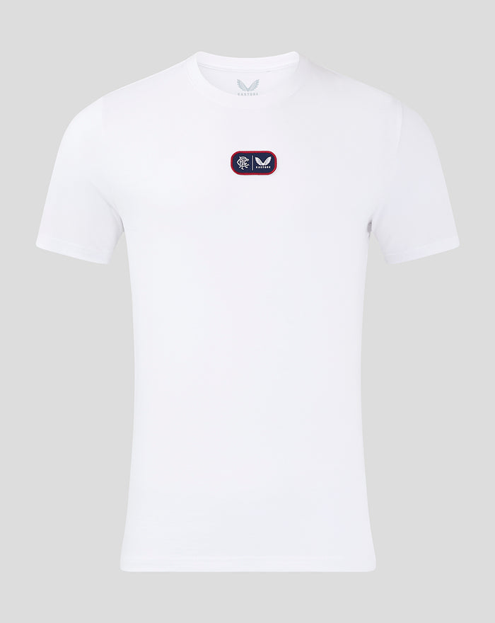 Front view of white mens 24/25 cotton t shirt with small navy crest patch edged in red on the chest.