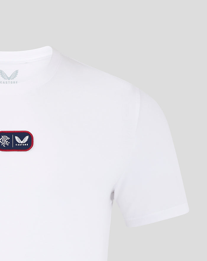 White cotton men's T-shirt with a small rectangular chest patch bearing a crest.