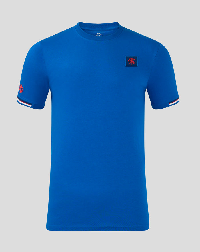 Front view of blue Men's Classic Cotton T Shirt with left chest crest patch and striped sleeve cuffs