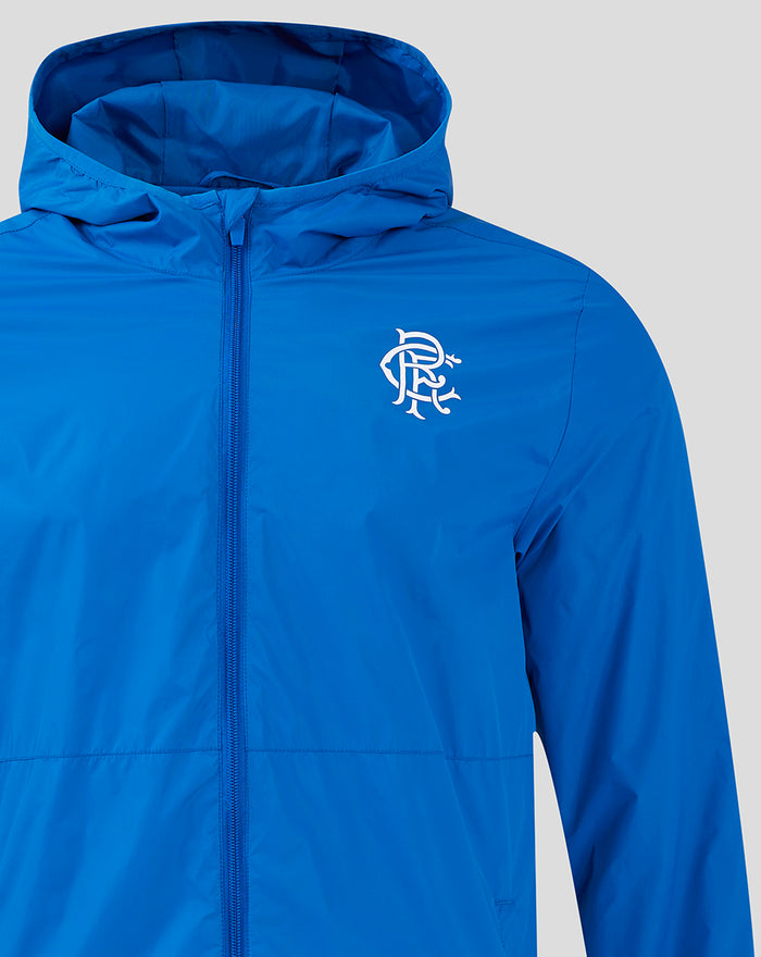 Detail of the blue Rangers FC core summer jacket with zipper and left chest crest