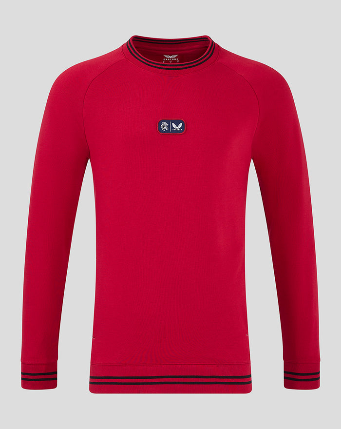 Red fleece crewneck with striped rib collar cuffs and hem and center chest dual branded badge