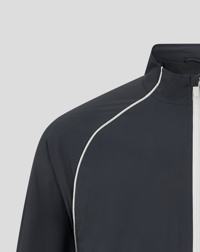 Detail shot of navy Rangers windbreaker collar and zipper with white piping and crest embroidery on chest
