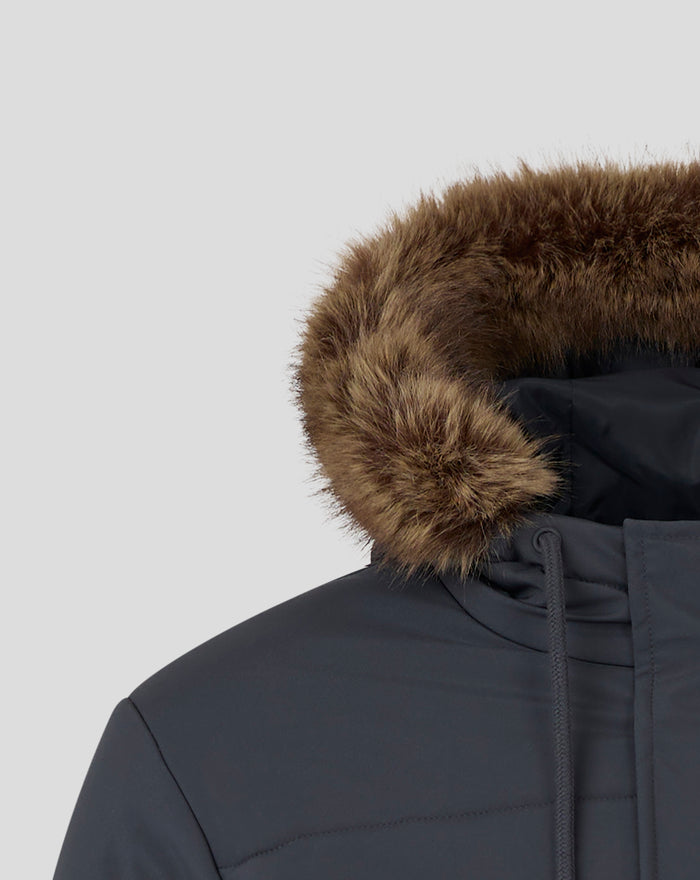 Close up of fur trimmed hood on navy Rangers FC parka showing faux fur and drawcords.