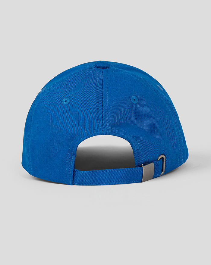Back view of blue Club Cap Junior showing adjustable strap and metal buckle.