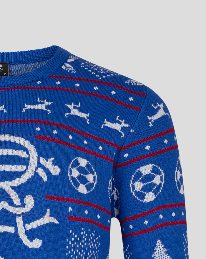 Close view of blue Rangers Christmas jumper featuring white trees and reindeer motifs with red decorative stripes