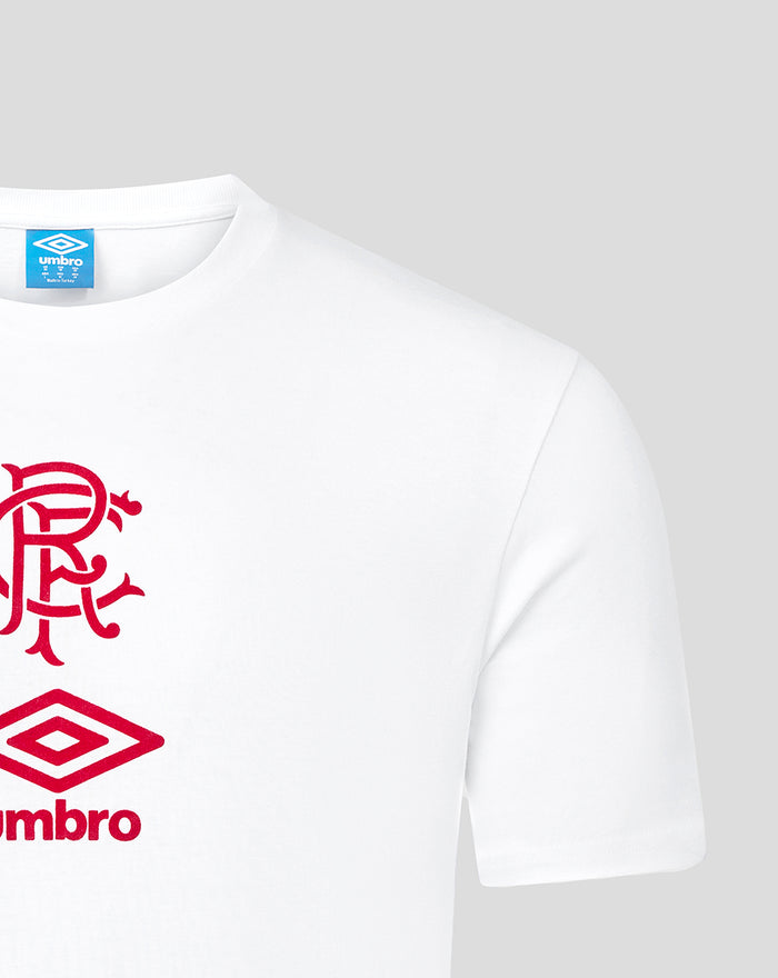 White junior travel short sleeve T shirt with red club crest and Umbro logo on the chest.
