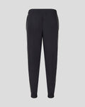 Back view of junior black travel pants with white side piping and ribbed cuffs