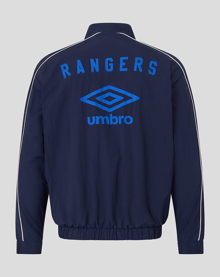 Back view of navy Rangers track jacket with large blue RANGERS lettering and the Umbro diamond logo.