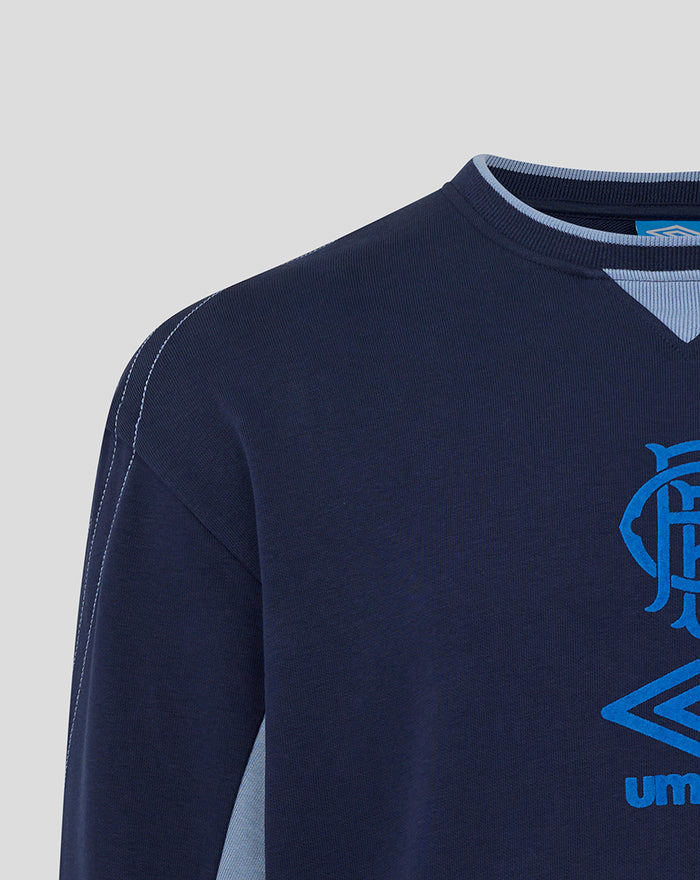 Peacoat navy travel crew sweatshirt with blue crest and Umbro logo on the chest