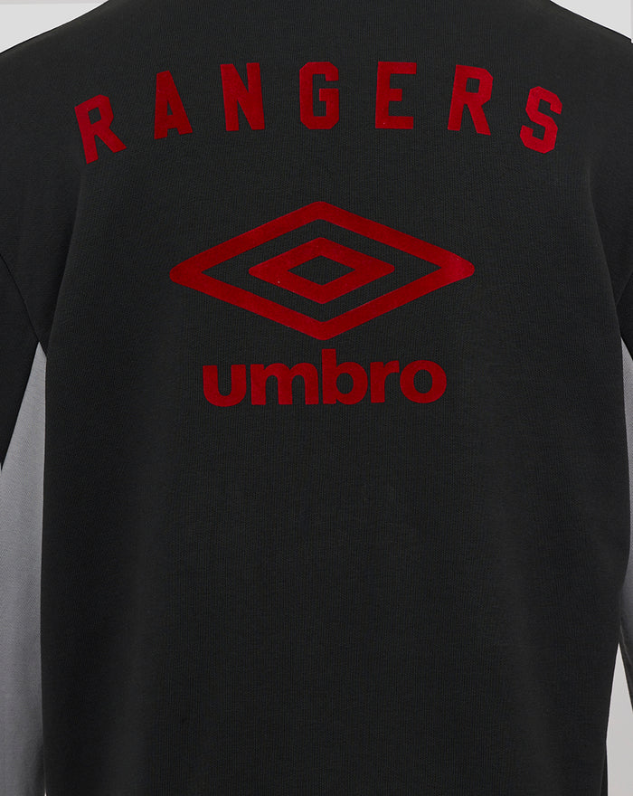 Back view of UNISEX travel hoodie in black shows bold red Rangers Umbro logo across the upper back.