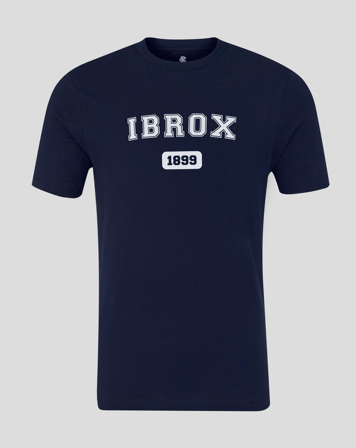 Navy unisex IBROX varsity tee featuring bold white outlined IBROX lettering and a white 1899 badge on the chest.