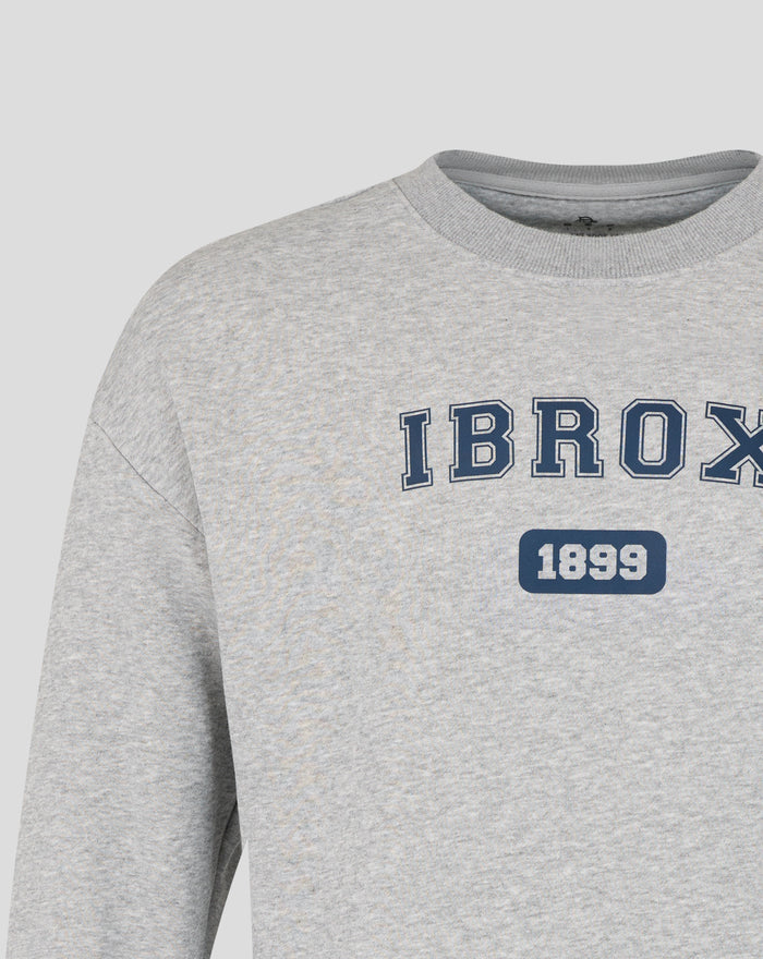 Front close up of the IBROX graphic on the grey crew sweatshirt with 1899 badge