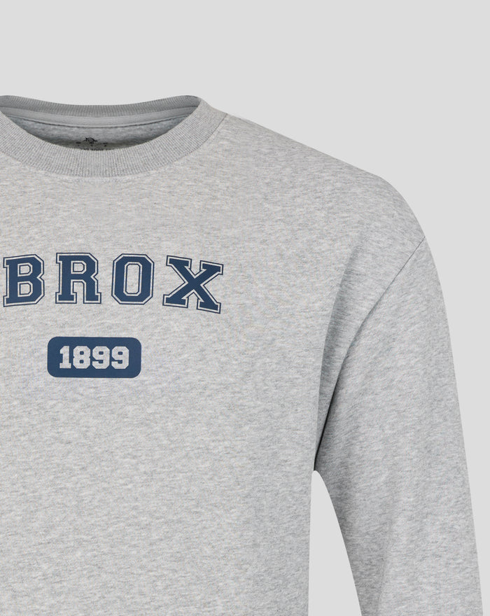 Light gray heathered IBROX varsity crewneck sweatshirt with navy outlined IBROX letters and a blue 1899 badge.