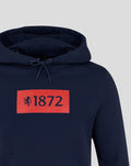 Navy hoodie with a bright orange rectangular 1872 emblem featuring a crest on the chest