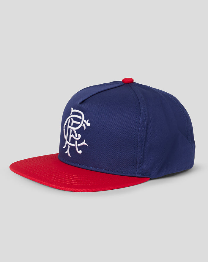 Side view of navy blue Rangers flat peak cap with red brim and white embroidered logo on front