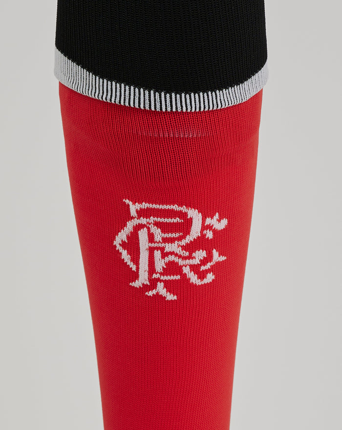Close up of Rangers Third Sock showing black cuff with white stripe and red leg with crest.